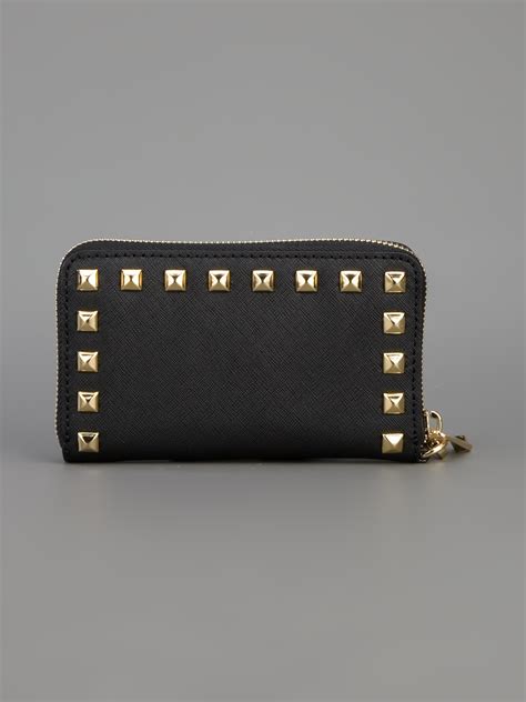 michael kors wallet clutch|Michael Kors studded clutch.